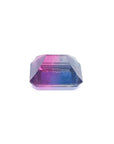 Natural 3.55 ct. watermelon tourmaline gemstone with vibrant red, mint, and greenish-blue hues.