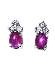 Natural star pink sapphire earrings cabochon and diamonds crafted in 14k white gold.