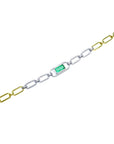 14K white and yellow gold paperclip bracelet with a vibrant emerald-cut emerald and diamond halo.