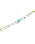 14K white and yellow gold paperclip bracelet with a vibrant emerald-cut emerald and diamond halo.