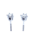 Top and underside view of a 14k white gold diamond stud earrings screw backs.