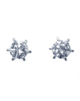 A pair of screw back natural diamond stud earrings white gold, topside position view.