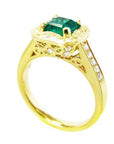 A 14k gold emerald ring for women top and gallery profile visibles.