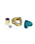 Components for a heart pendant: gold setting with diamonds, loose diamond, emerald, and gold bail.