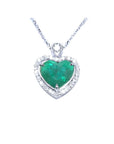 2.64 carat natural emerald heart pendant in 14K white gold, framed by diamonds on a delicate chain.