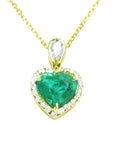 Heart-shaped emerald pendant with gold and diamonds frame on a white background.