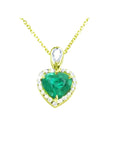 14K yellow gold heart pendant with a medium-deep green emerald and diamond halo on a delicate chain.