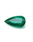 Natural emerald pear cut from muzo mine Colombia, eye-clean gemstone vivid bluish-green color.