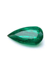 Natural emerald pear cut from muzo mine Colombia, eye-clean gemstone vivid bluish-green color.