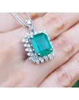 7.78 ct natural rectangular emerald pendant with double halo diamonds in 14K white gold, antique style.