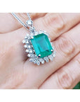 7.78 ct natural rectangular emerald pendant with double halo diamonds in 14K white gold, antique style.