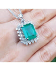 7.78 ct natural rectangular emerald pendant with double halo diamonds in 14K white gold, antique style.