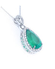 Natural colombian emerald pendant teardrop from the Muzo mines made of 14k white gold.