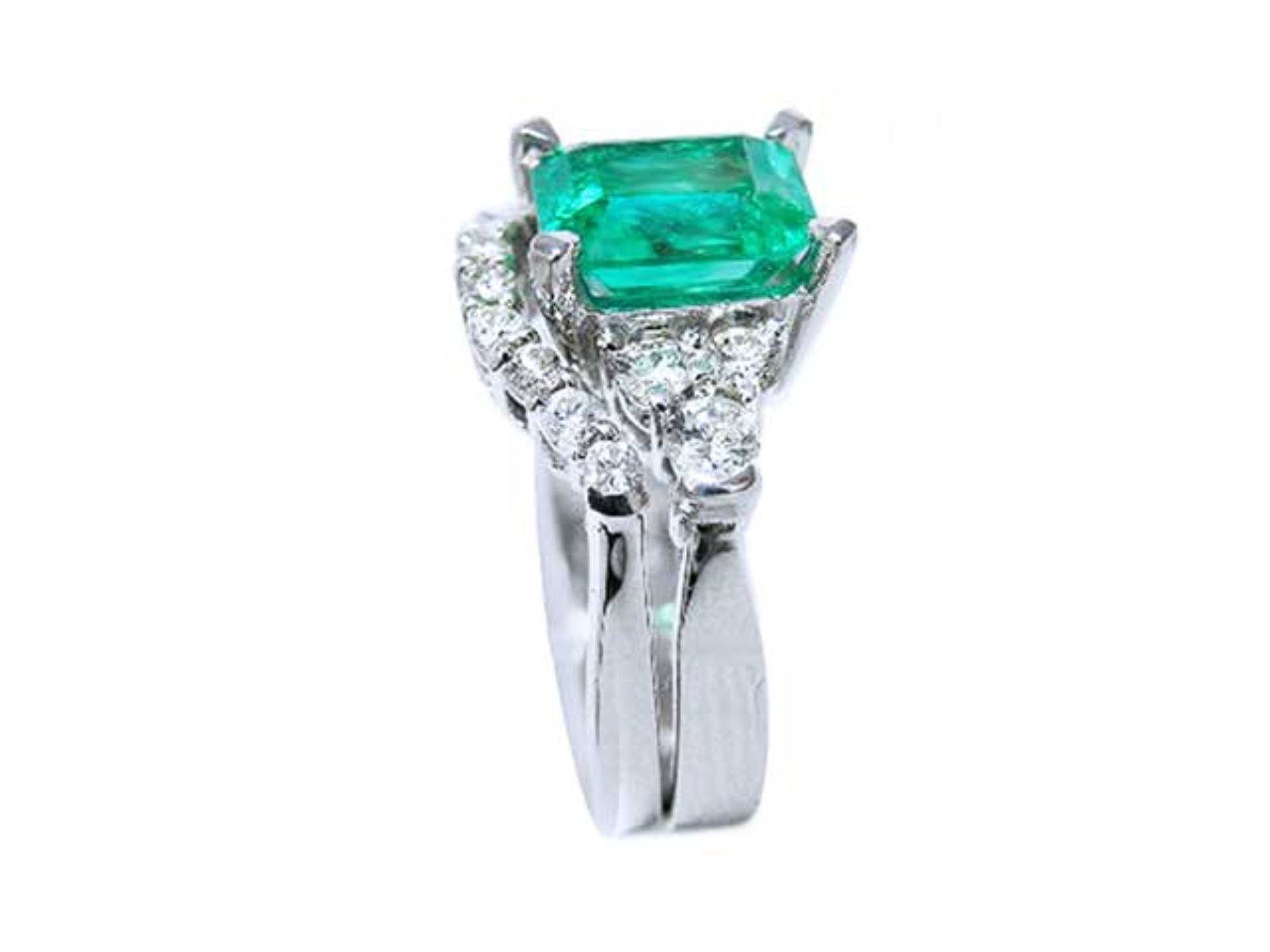 Side profile of the square emerald on top, side diamonds and band ring with the matching band together.