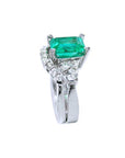 Side profile of the square emerald on top, side diamonds and band ring with the matching band together.