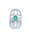 Silver ring with a genuine emerald on a white background.