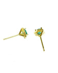 Hexagon emerald and diamond stud earrings in 14K yellow gold.