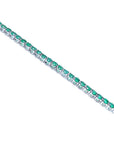 Colombian emerald tennis bracelet with round green emeralds in 14K white gold.