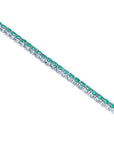 Colombian emerald tennis bracelet with round green emeralds in 14K white gold.