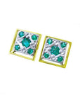 Pair of diamond-shaped cufflinks for men with round cut natural emeralds on a topside view display.