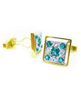 14K yellow gold men's cufflinks with diamond-shaped Colombian emeralds and milgrain detailing.