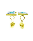 Pair of 14K yellow gold men's cufflinks with green emeralds in a diamond-shaped design.