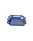 Sparkling 1.31 ct natural loose blue sapphire gemstone with emerald cut.