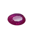 2.12 carat loose natural ruby, rich red oval cut gemstone with sparkling facets.