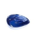 3.67 ct. loose natural pear-cut deep blue sapphire gemstone with brilliant facets.