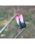 Emerald cut 6.11 ct natural loose watermelon tourmaline, deep bluish green and red orange.
