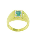 Men's 14K yellow gold ring with a rectangular emerald-cut Muzo emerald and diamond halo.