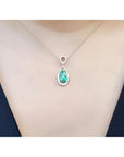 1.35 ct natural emerald pear pendant necklace with diamond bail on 14K white gold chain.