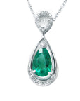 Teardrop-shaped emerald pendant on a white background.