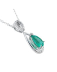 1.35 ct. natural pear-shaped emerald pendant necklace in 14K white gold with diamond accents.