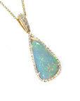 8.05 ct pear-shaped Australian opal pendant with bluish-green play of color, halo diamonds, and 18K yellow gold chain.