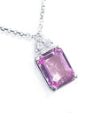 Right side top view of a natural pink sapphire necklace emerald cut 2.01 carats 14k white gold.