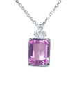 Natural pink sapphire pendant necklace emerald cut medium light color, eye clean and very brilliant set in 14k white gold.