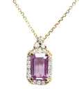 Natural pink sapphire necklace pendant rectangular emerald cut in a medium light hue, surrounded by a halo of natural diamonds and set in 14k gold.