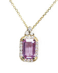 Natural pink sapphire necklace pendant rectangular emerald cut in a medium light hue, surrounded by a halo of natural diamonds and set in 14k gold.