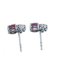 Natural pink sapphire cabochon oval cut stud earrings, prong set in 14k white gold.