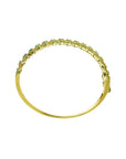 14K gold bangle bracelet with round cut bluish-green emeralds in square links with rope borders.
