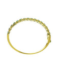 14K gold bangle bracelet with round cut bluish-green emeralds in square links with rope borders.