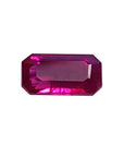 1.11 carat natural emerald-cut ruby gemstone with deep pinkish-red color.