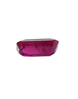 1.11 carat natural emerald cut ruby gemstone with deep pinkish-red color.