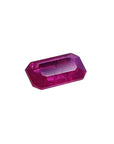 1.11 carat natural ruby gemstone, emerald cut, with deep pinkish-red color.