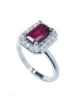Women's 14K white gold ring with an emerald-cut deep red ruby and diamond halo.