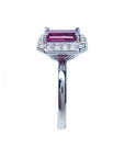 Women's 14K white gold ring with an emerald-cut deep red ruby and diamond halo.