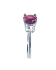 Round cut 1.64 ct. pinkish-red Mozambique ruby ring with accented diamonds in 14k white gold.