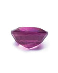 1.64 carat natural loose ruby with a round cut and vibrant medium red hue.