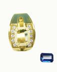 18K yellow gold men's ring setting with diamond accents, next to a loose rectangular blue sapphire.